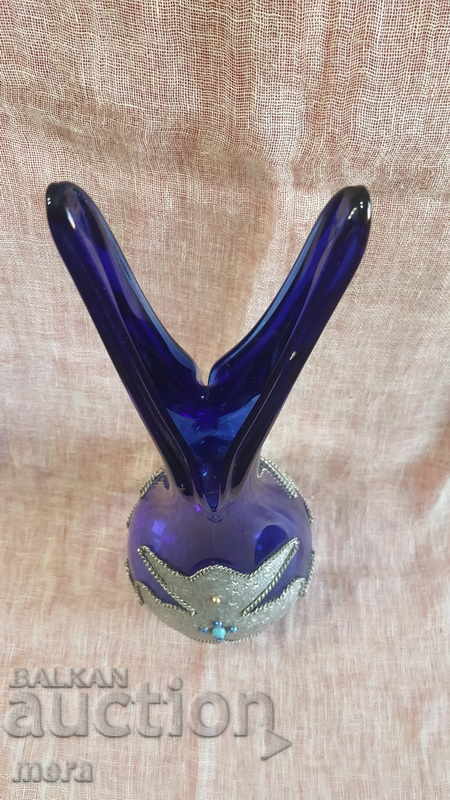 Delivery of Antique vase made of colored glass and metal fittings