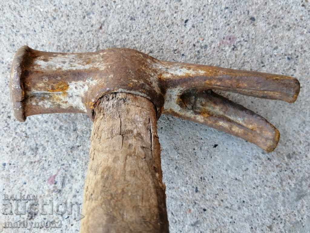 Delivery of Old carpenter's hammer, tool, Tesla pickaxe Delivery of Old carpenter's hammer, tool, Tesla pickaxe