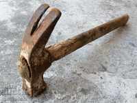 Old carpenter's hammer, tool, Tesla pickaxe