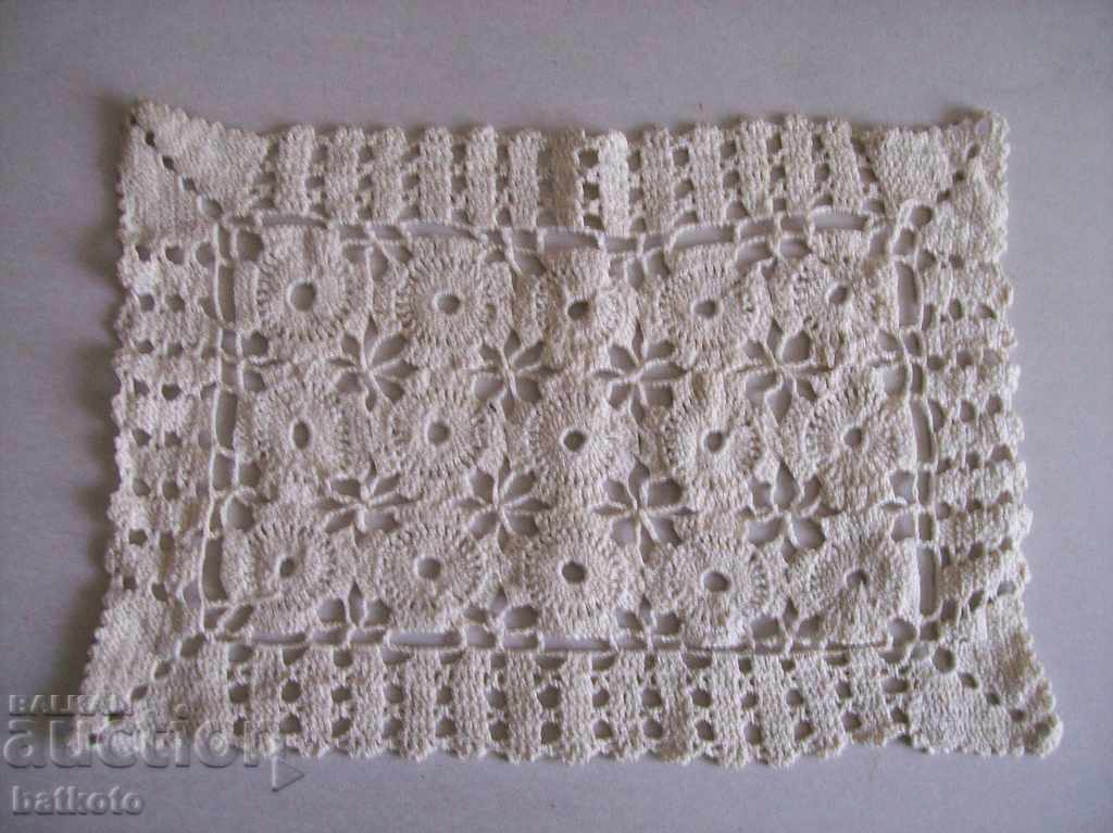Mână veche tricotată din sos
