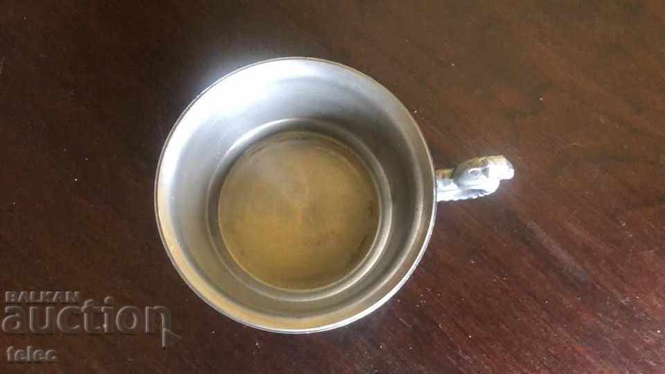 Delivery of Beautiful metal coffee cup with markings Delivery of Beautiful metal coffee cup with markings