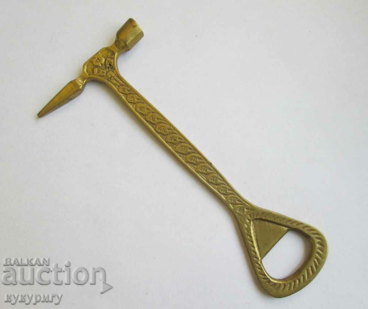 Old bronze hammer opener