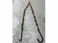 Old forged chain with hook, hearth for hearth chain hook