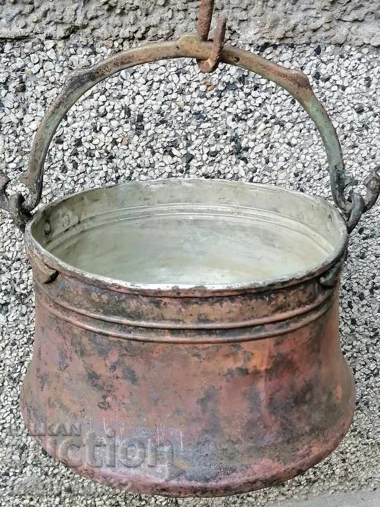 An old copper boiler, a pot, a malt, a baker