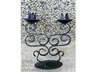 Old forged candlestick, candle