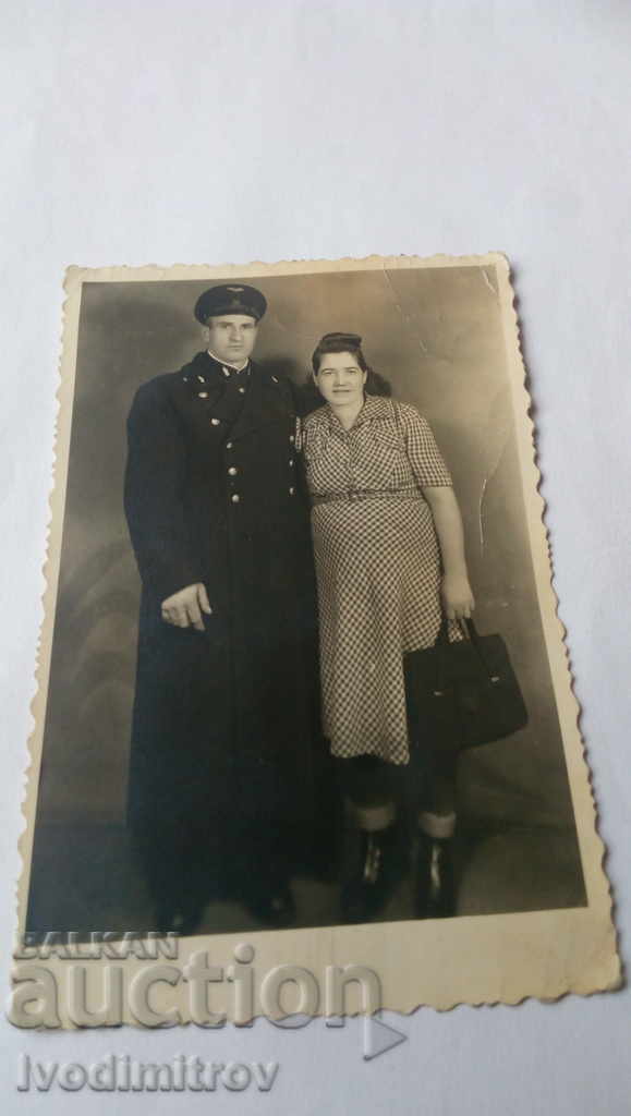 Postcard Woman and man in railway uniform 1950