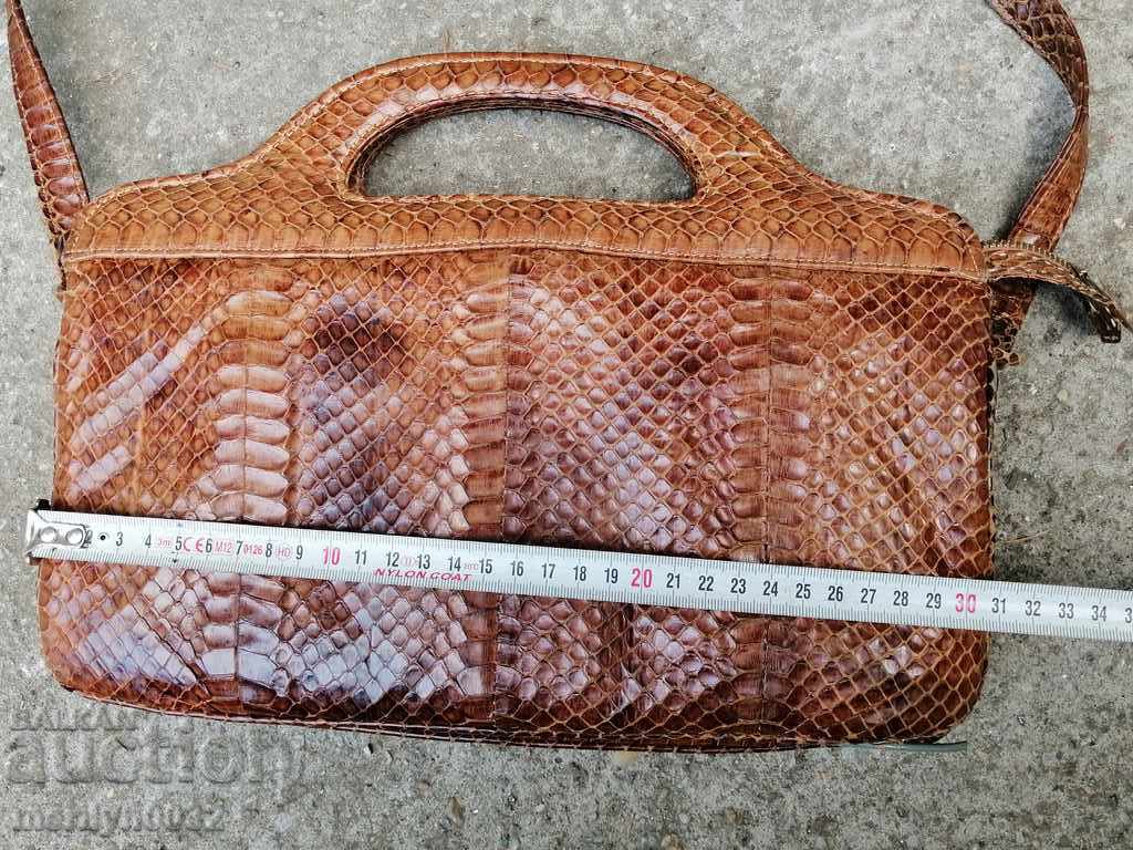 Delivery of Women's Leather Python Skin Handbag Delivery of Women's Leather Python Skin Handbag