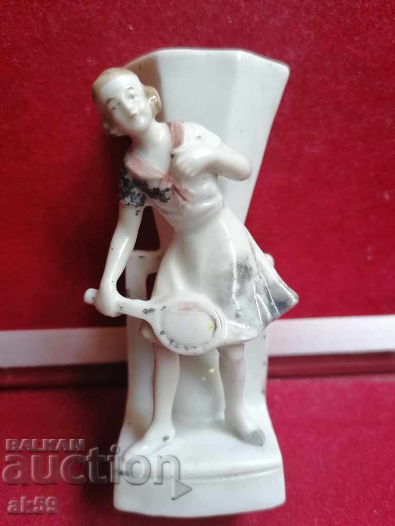 An old porcelain figure.
