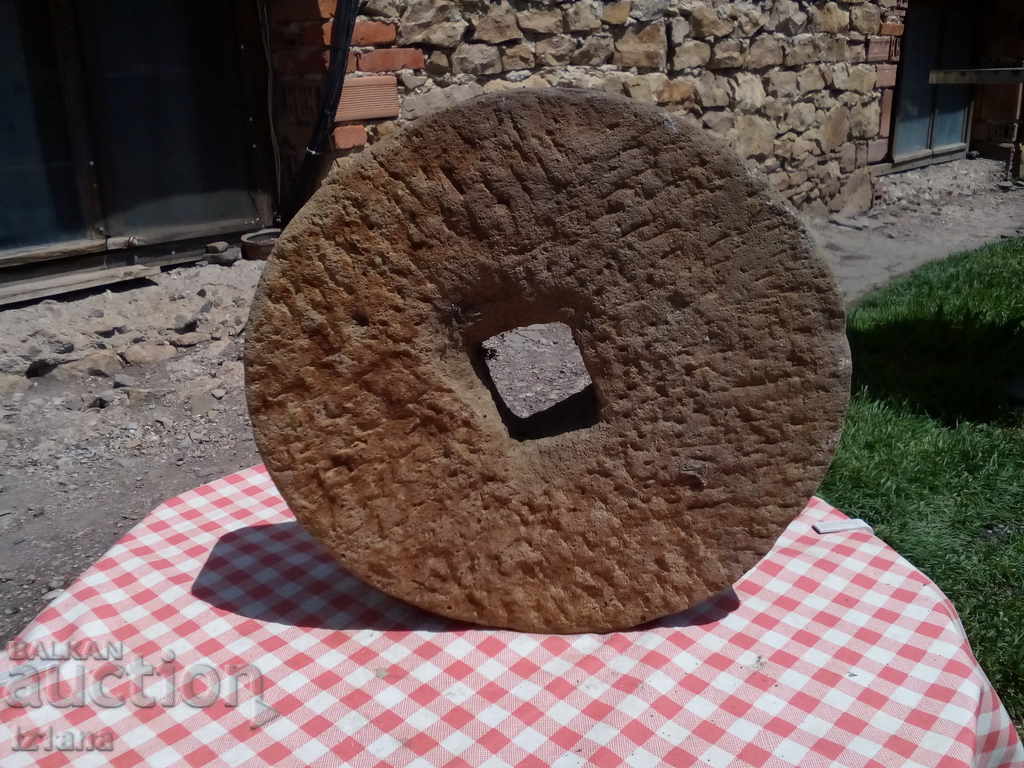 Auction An old stone mill of cut stone Auction An old stone mill of cut stone