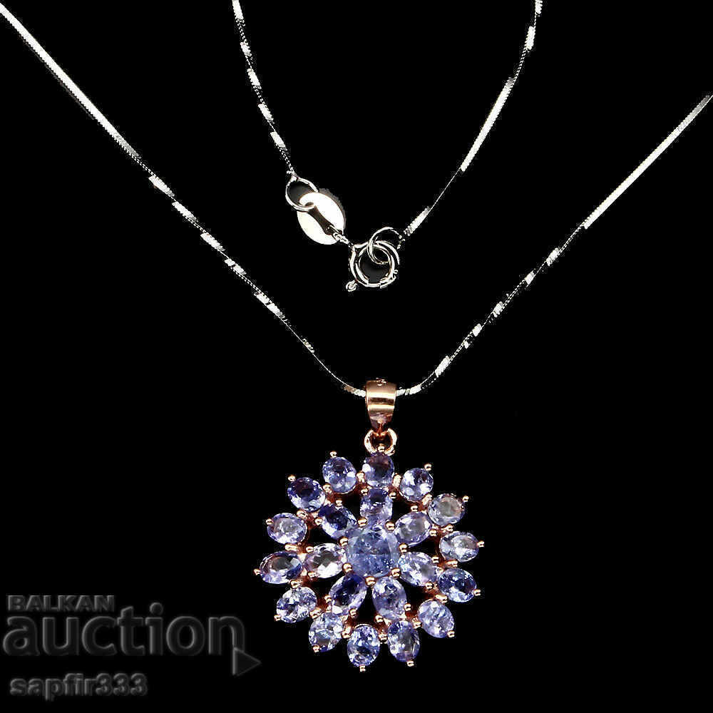 Auction DESIGNER MEDALLION WITH NATURAL TANZANITE "SUN" Auction DESIGNER MEDALLION WITH NATURAL TANZANITE "SUN"