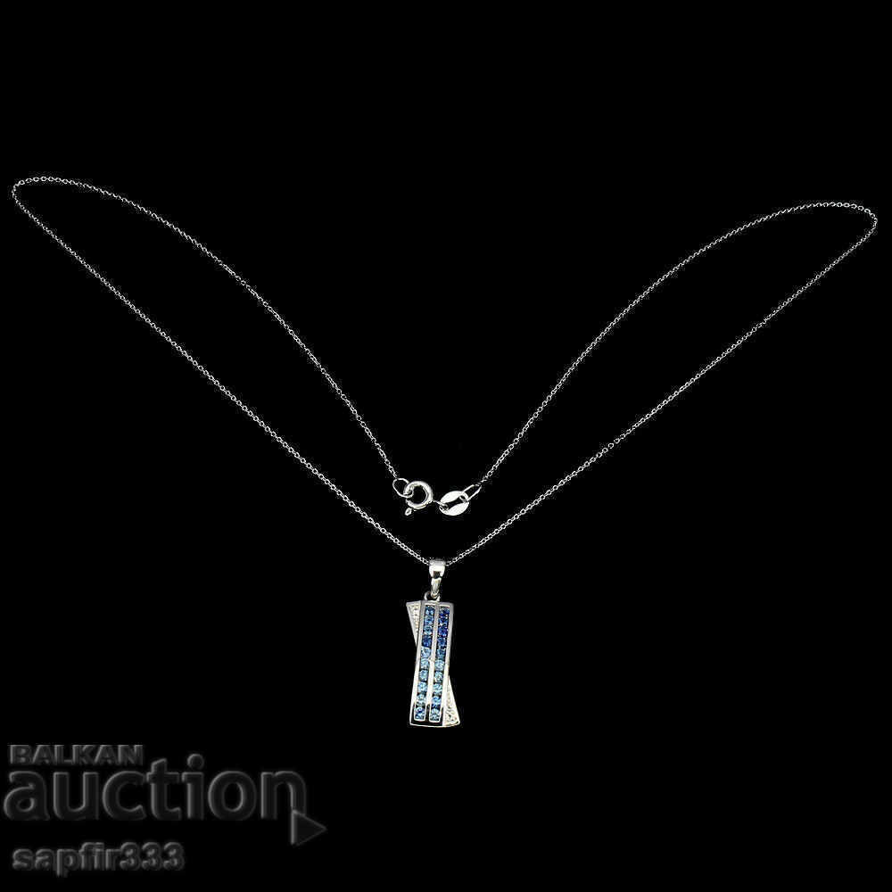 Auction  UNICEX SILVER MEDALLION WITH NATURAL SAPPHIERS AND WHITE TOPAS