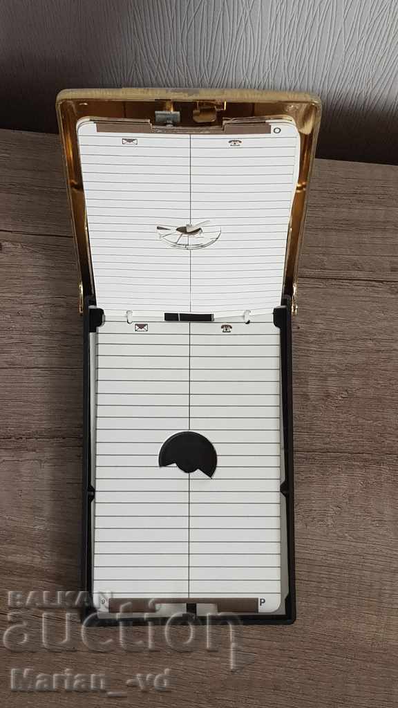 Auction  Old metal telephone notebook with alphabet