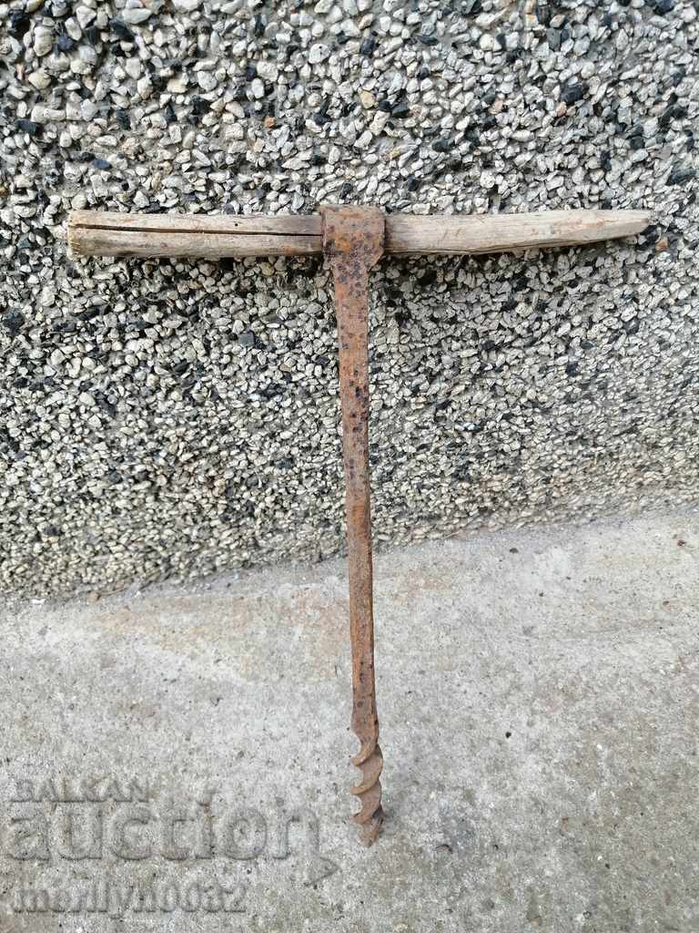 Ancient crutch, burgundy, screwdriver, wrought iron
