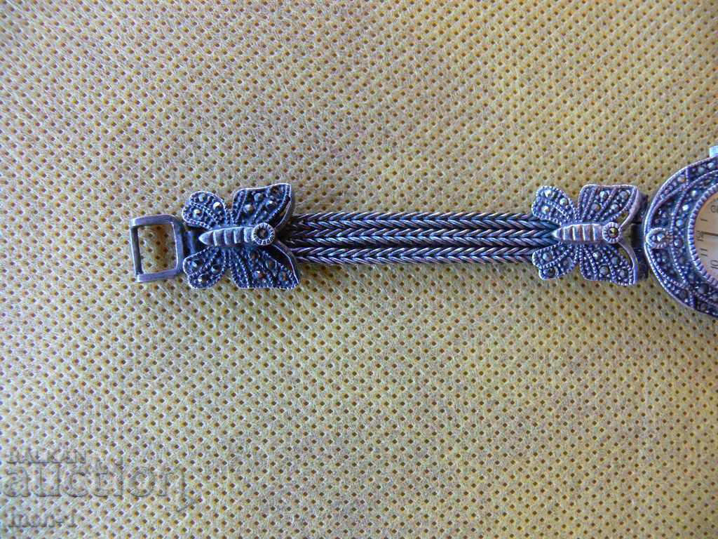 Auction  LUXURIOUS SILVER WATCH