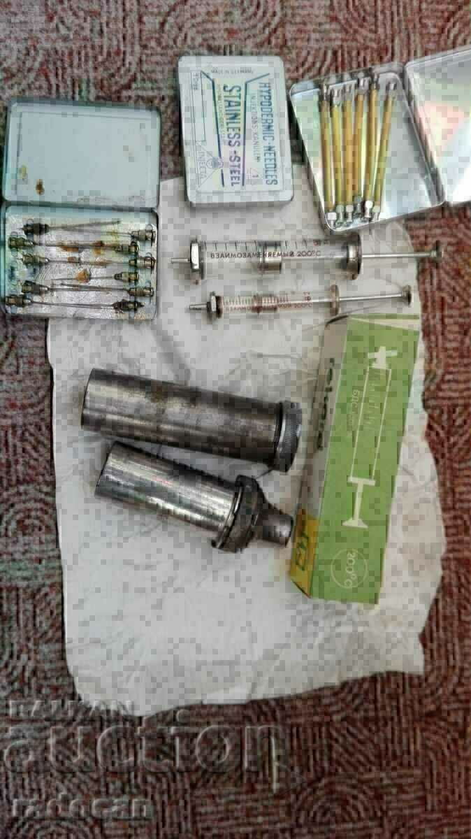 Old medical set of syringes, needles and swab containers with price 28.00 BGN | € 14.32 Old medical set of syringes, needles and swab containers with price 28.00 BGN | € 14.32