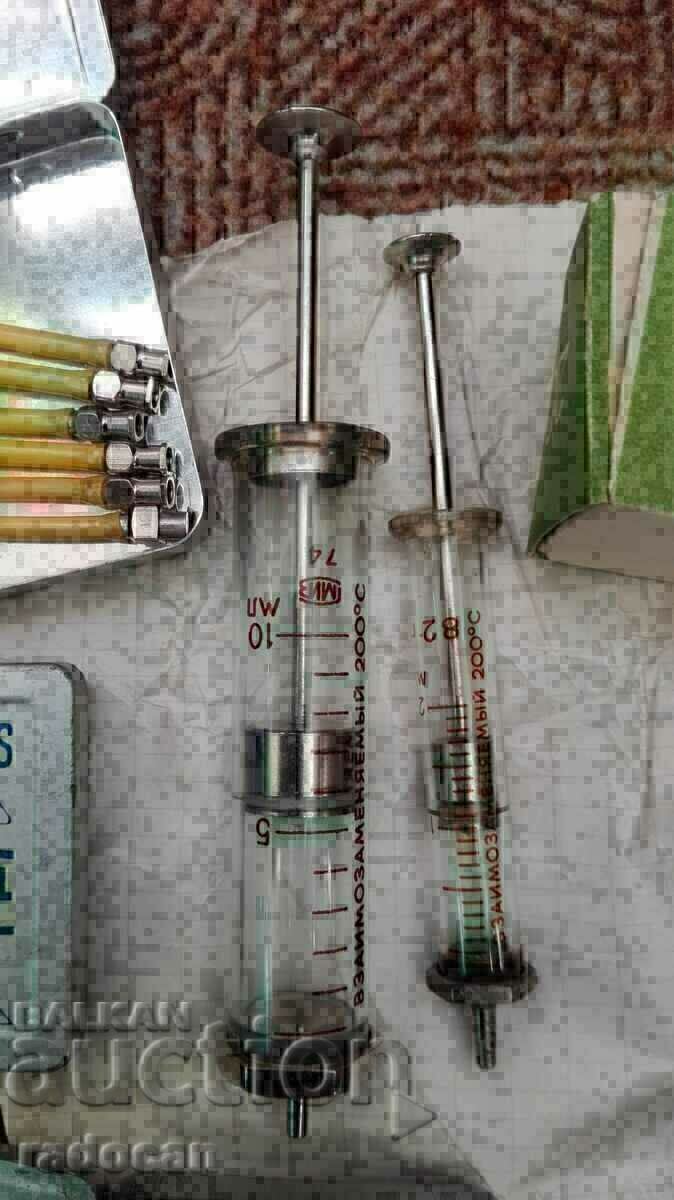 Auction Old medical set of syringes, needles and swab containers Auction Old medical set of syringes, needles and swab containers
