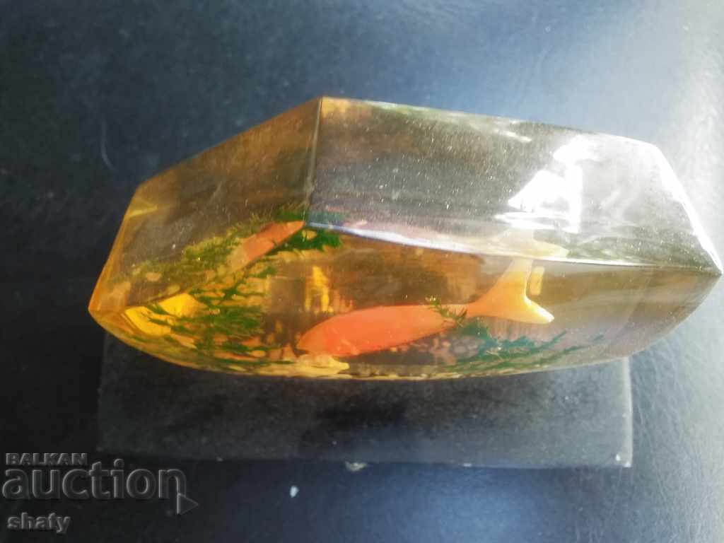 Auction  Old aquarium decoration with fish.