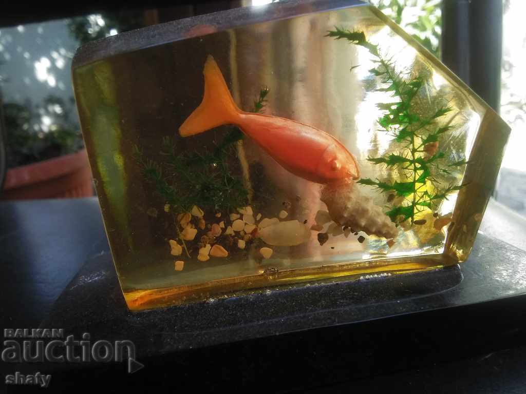 Delivery of Old aquarium decoration with fish.