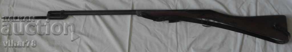 old wooden rifle with bayonet model