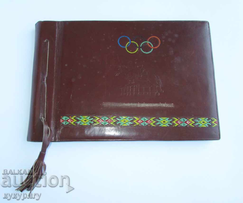 An old old blank photo album from the Olympics