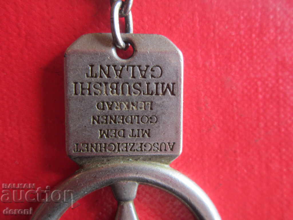 Delivery of Unique award-winning Golden Handlebar keychain Delivery of Unique award-winning Golden Handlebar keychain