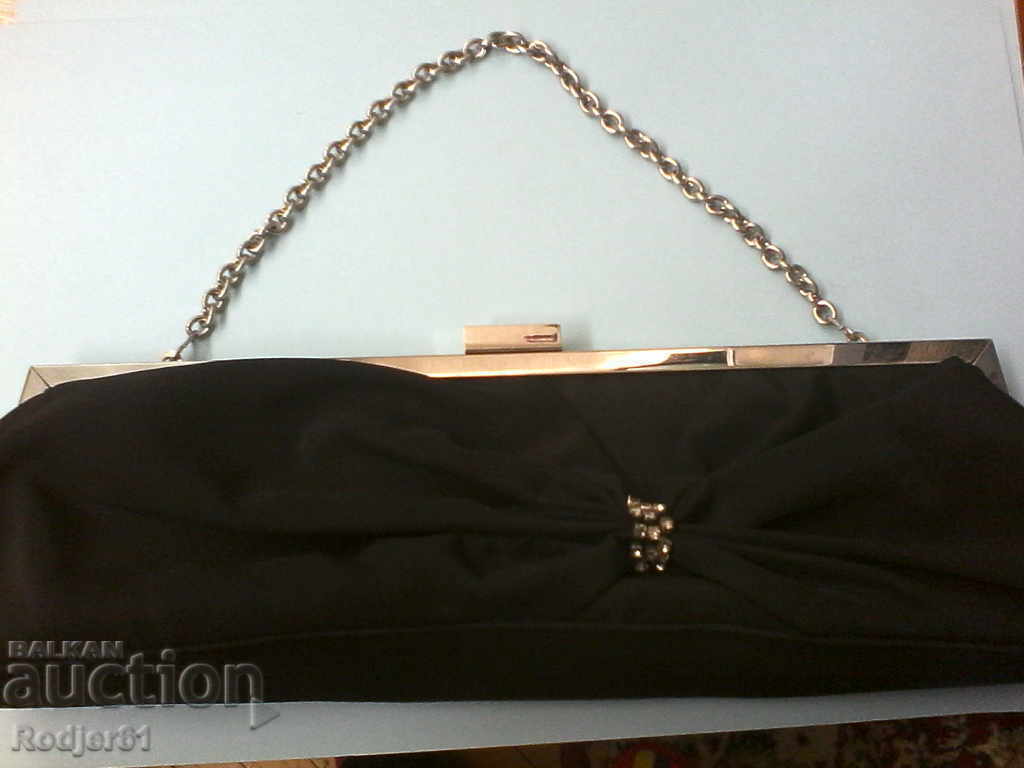 Delivery of Women's accessories - De Vib cocktail bag