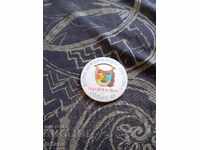 Old Theater Badge in a Suitcase