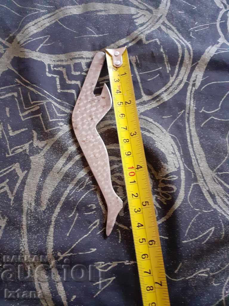 Auction An old bottle opener Auction An old bottle opener