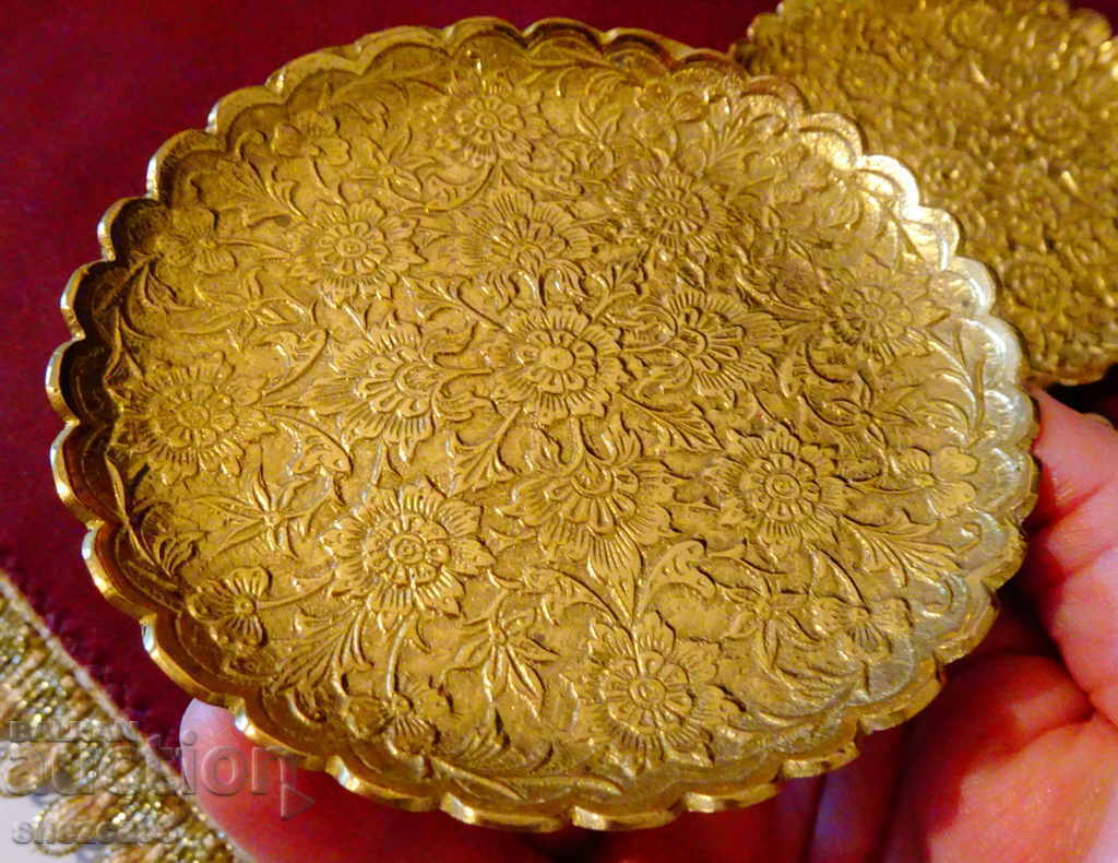 Antique embossed bronze plate, coaster. Antique embossed bronze plate, coaster.