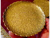 Antique embossed bronze plate, pad.