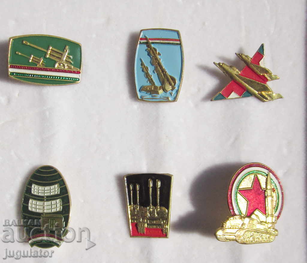 Delivery of collection of old Hungarian military insignia badges in a box Delivery of collection of old Hungarian military insignia badges in a box