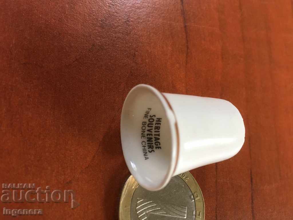 Thimble porcelain with price 5.00 BGN | € 2.56 Thimble porcelain with price 5.00 BGN | € 2.56