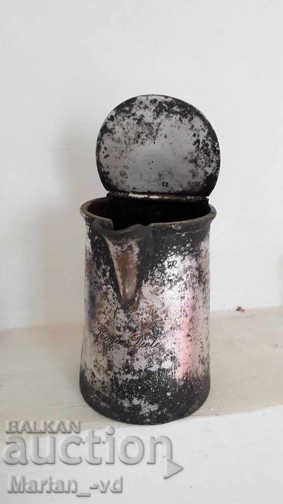 Auction An old silver-plated jug Auction An old silver-plated jug