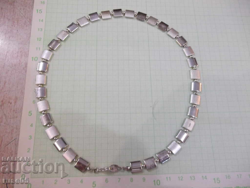Delivery of Necklace of square plates Delivery of Necklace of square plates