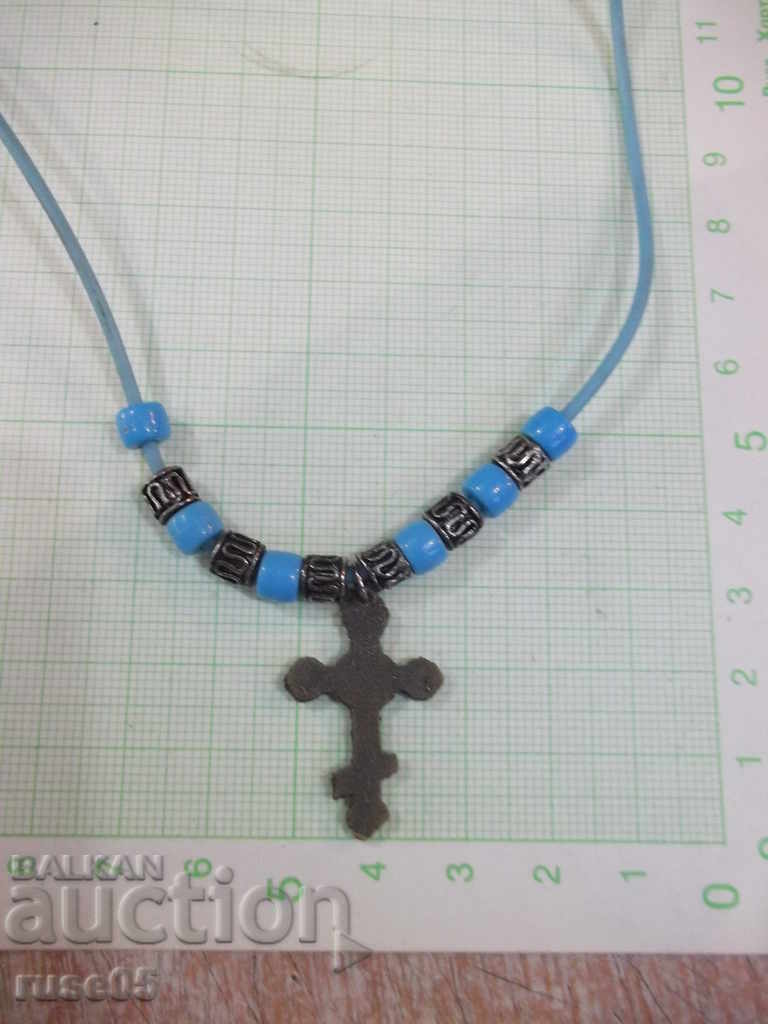 Delivery of Necklace with a cross