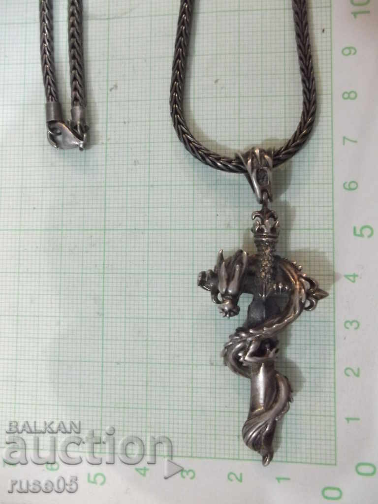 Pendant "Dragon around a cross" with a silver chain - 53.42 g. with price 160.00 BGN | € 81.81 Pendant "Dragon around a cross" with a silver chain - 53.42 g. with price 160.00 BGN | € 81.81