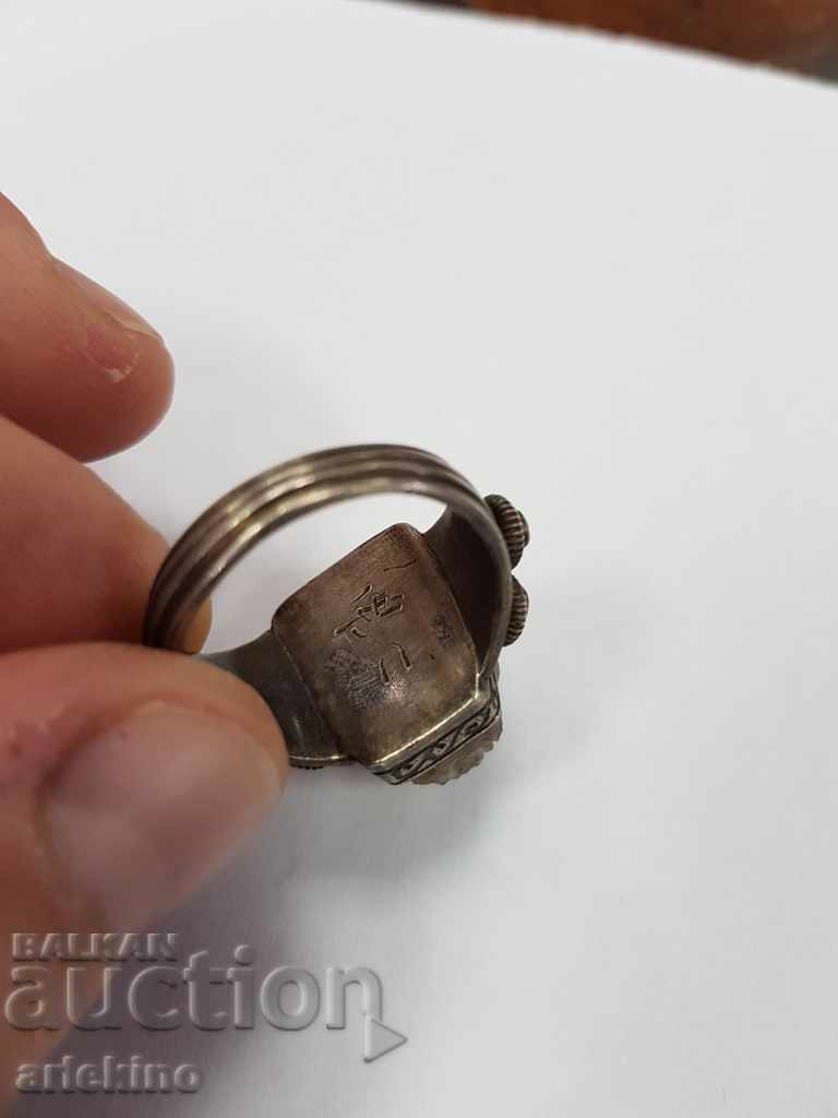 Delivery of Collectible men's silver ring with cameo male head