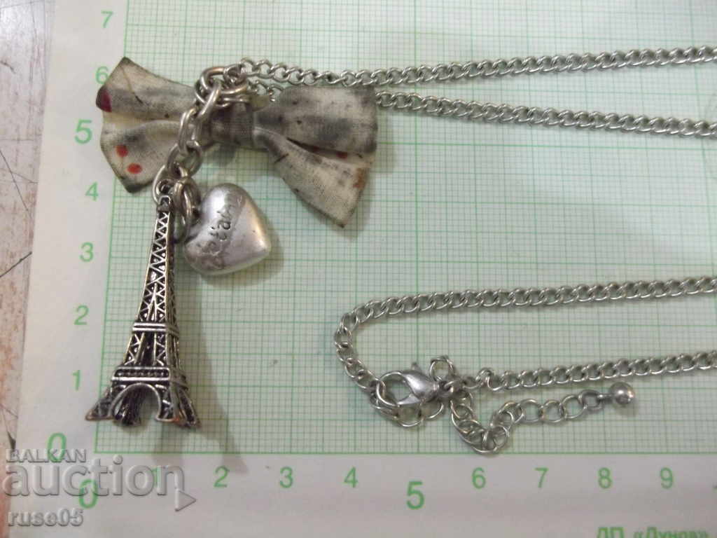 Delivery of Pendant "Eiffel Tower and heart" with a chain Delivery of Pendant "Eiffel Tower and heart" with a chain