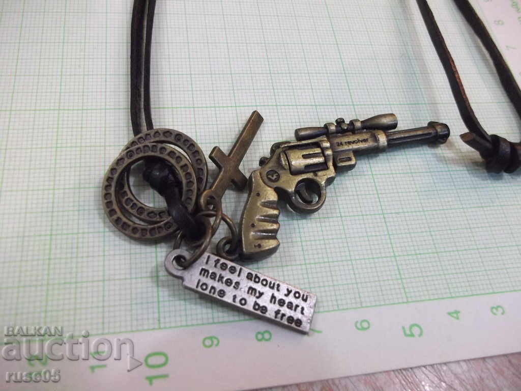 Auction  Pendants set with leather strap