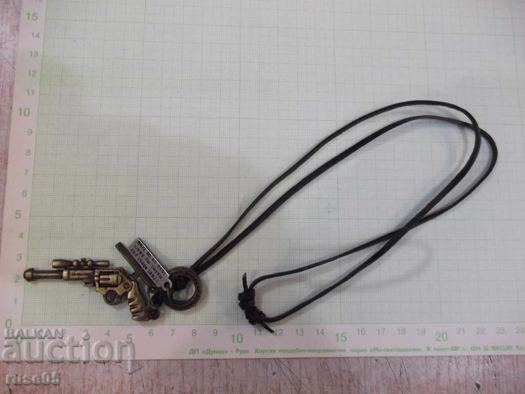 Delivery of Pendants set with leather strap