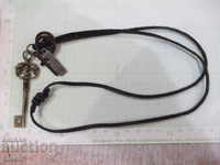 Pendants set with leather strap - 1