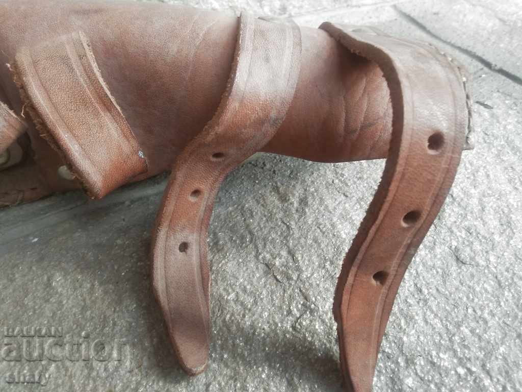 Delivery of An old leather scabbard for a gouge tool or large knife. Delivery of An old leather scabbard for a gouge tool or large knife.