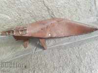 An old leather scabbard for a gouge tool or large knife.