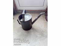 Old garden watering can