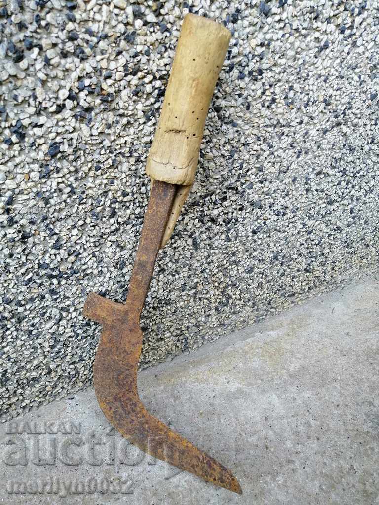 Old hand forged hammer, wrought iron blade