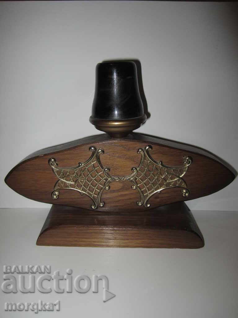 Retro wooden candlestick with metal fittings