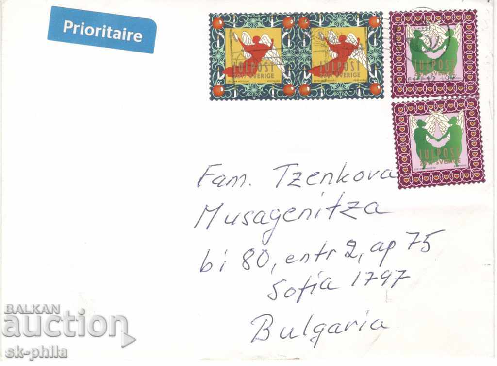 Envelope - traveled with 4 stamps