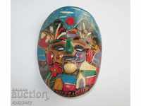 Small painted ceramic mask wall decoration