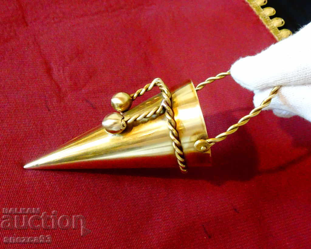 Festive decoration made of brass, candlestick.