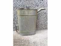Old metal can, galvanized tube, bucket, pot